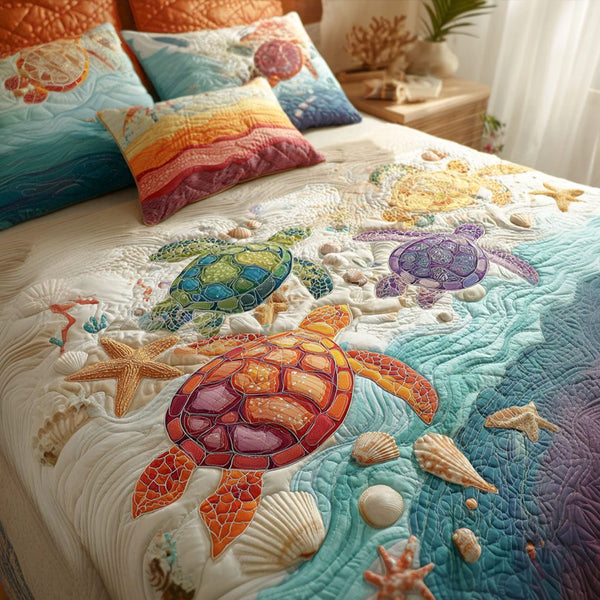 Coral Coastline quilted 3-piece bedding set on a made bed in a light coastal bedroom