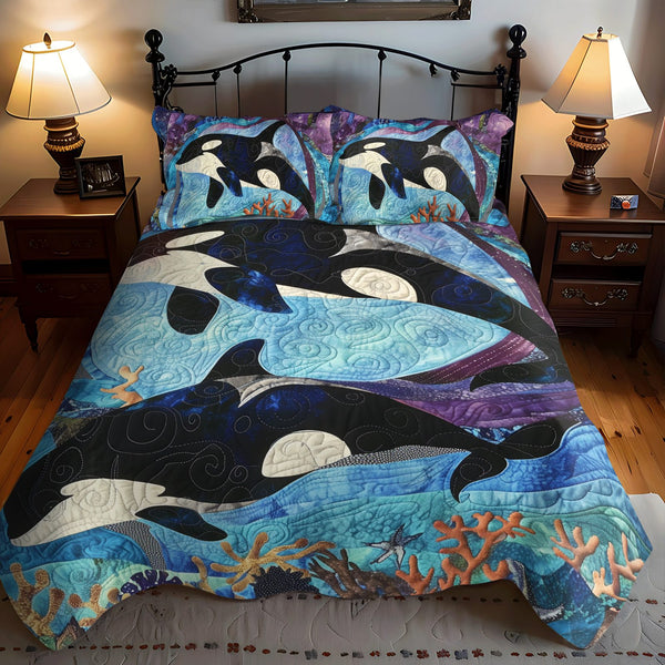 Coral Constellation quilted 3-piece bedding set on a made bed in a light coastal bedroom