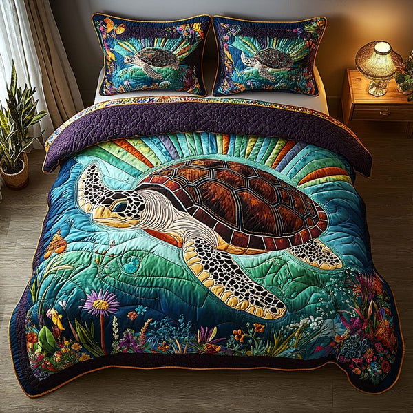 Coral Dreamer quilted 3-piece bedding set on a made bed in a light coastal bedroom