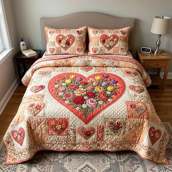 Coral Garden quilted 3-piece bedding set on a made bed in a light coastal bedroom