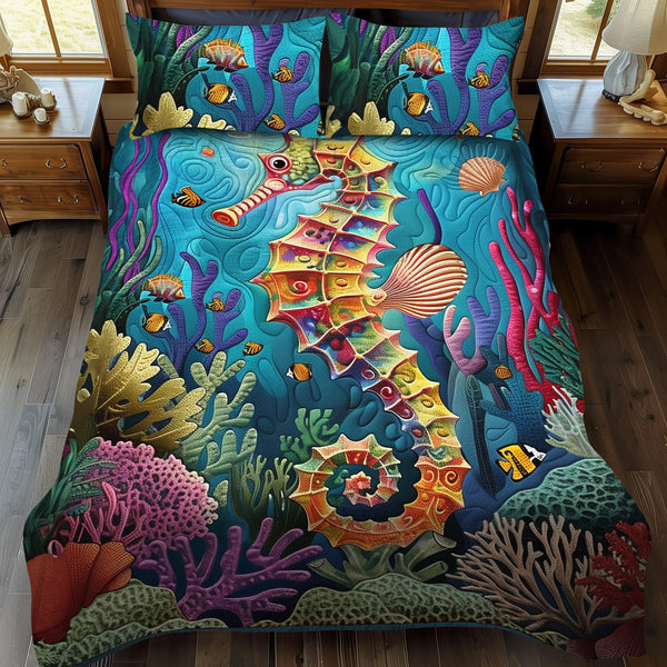 Coral Kingdom quilted 3-piece bedding set on a made bed in a light coastal bedroom