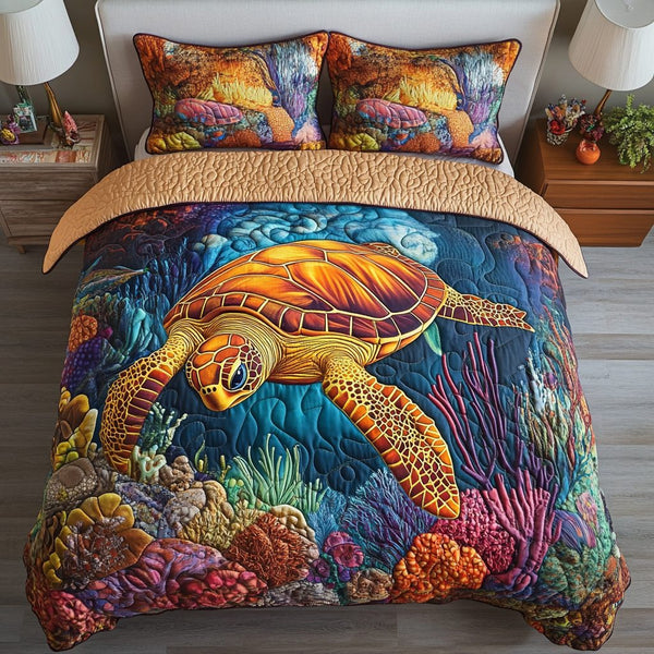 Coral Voyage quilted 3-piece bedding set on a made bed in a light coastal bedroom