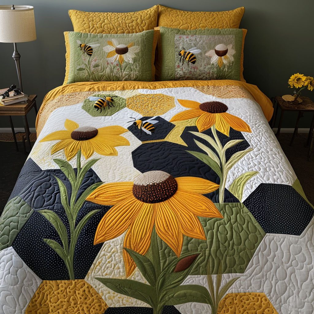 Cornflower Cascade quilted 3-piece bedding set on a made bed with two matching pillow shams