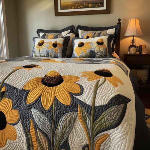 Cornflower Dreams quilted 3-piece bedding set on a made bed with two matching pillow shams