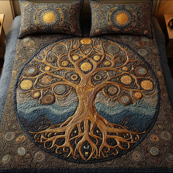 Cosmic Circle quilted 3-piece bedding set on a made bed with two matching pillow shams