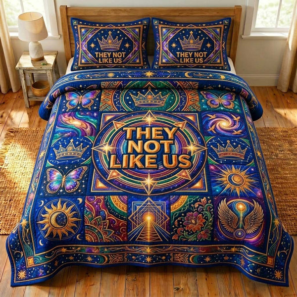 Cosmic Crown quilted 3-piece bedding set on a made bed with two matching pillow shams