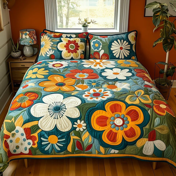 Cosmic Flower quilted 3-piece bedding set on a made bed with two matching pillow shams