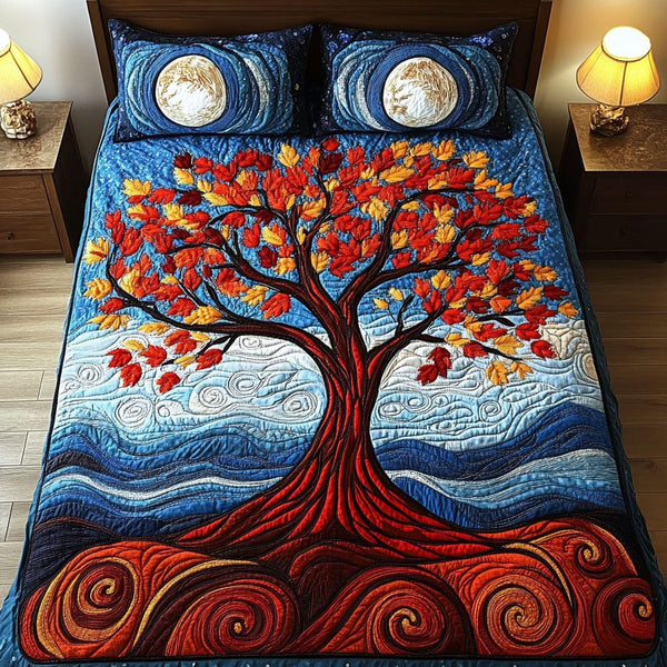 Cosmic Tree quilted 3-piece bedding set on a made bed with two matching pillow shams