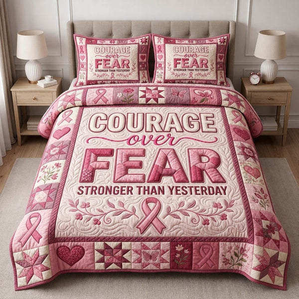Courage Over Fear quilted 3-piece bedding set on a made bed with two matching pillow shams