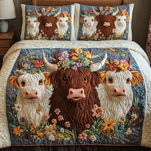 Cow Blooms quilted 3-piece bedding set on a made bed with two matching pillow shams