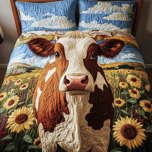 Cow Comfort quilted 3-piece bedding set on a made bed with two matching pillow shams