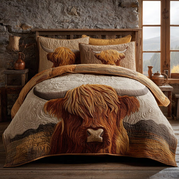 Cow Whispers quilted 3-piece bedding set on a made bed with two matching pillow shams