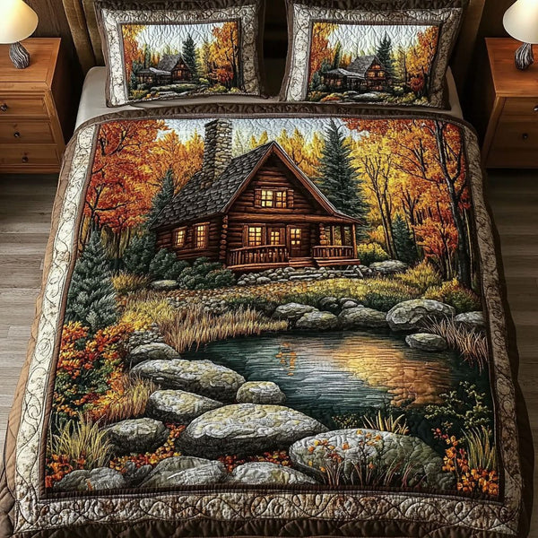 Cozy Autumn Retreat quilted 3-piece bedding set on a made bed with two matching pillow shams
