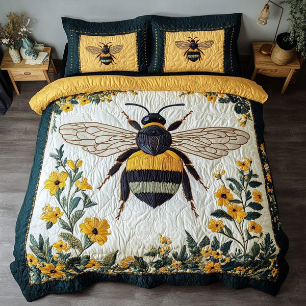 Cozy Bee Bloom quilted 3-piece bedding set on a made bed with two matching pillow shams