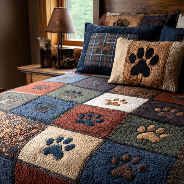 Cozy Cabin Paws quilted 3-piece bedding set on a made bed with two matching pillow shams