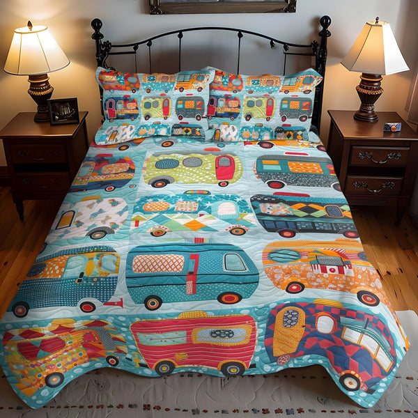 Cozy Caravan quilted 3-piece bedding set on a made bed with two matching pillow shams