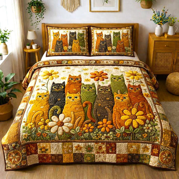 Cozy Cat quilted 3-piece bedding set on a made bed with two matching pillow shams