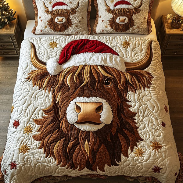 Cozy Cow quilted 3-piece bedding set on a made bed with two matching pillow shams