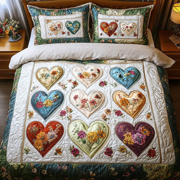 Cozy Feeling quilted 3-piece bedding set on a made bed with two matching pillow shams