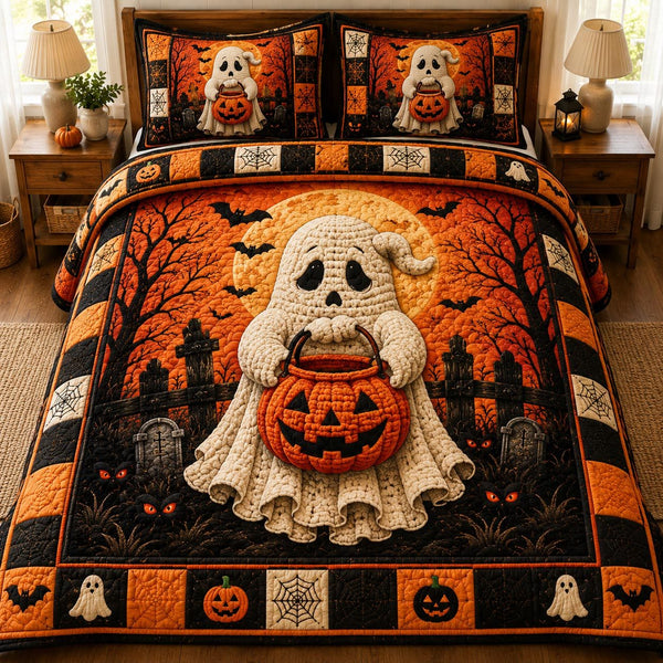 Cozy Haunting quilted 3-piece bedding set on a made bed with two matching pillow shams