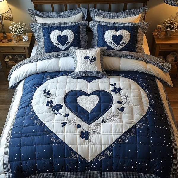 Cozy Heartbeat quilted 3-piece bedding set on a made bed with two matching pillow shams