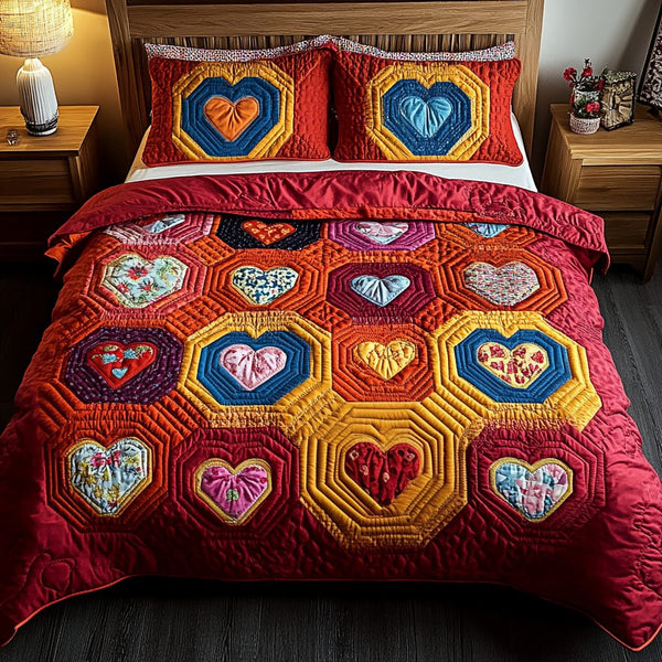 Cozy Hearts quilted 3-piece bedding set on a made bed with two matching pillow shams