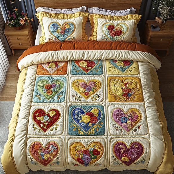 Cozy Hearts quilted 3-piece bedding set on a made bed with two matching pillow shams