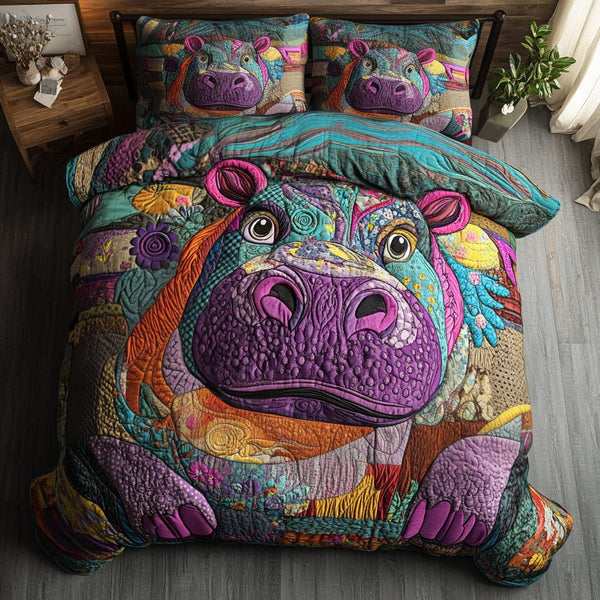 Cozy Hippo quilted 3-piece bedding set on a made bed with two matching pillow shams