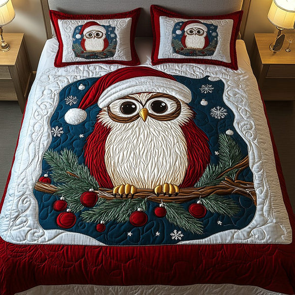Cozy Owls quilted 3-piece bedding set on a made bed with two matching pillow shams