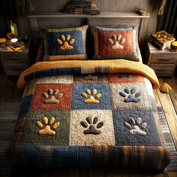 Cozy Paw Haven quilted 3-piece bedding set on a made bed with two matching pillow shams
