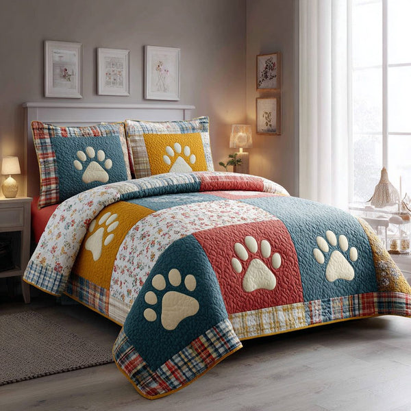 Cozy Paw Trail quilted 3-piece bedding set on a made bed with two matching pillow shams