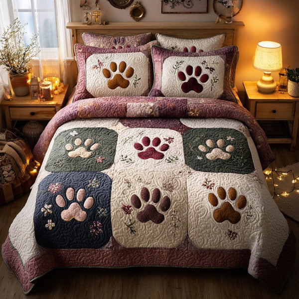 Cozy Paws quilted 3-piece bedding set on a made bed with two matching pillow shams