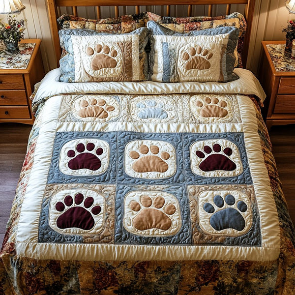 Cozy Paws quilted 3-piece bedding set on a made bed with two matching pillow shams