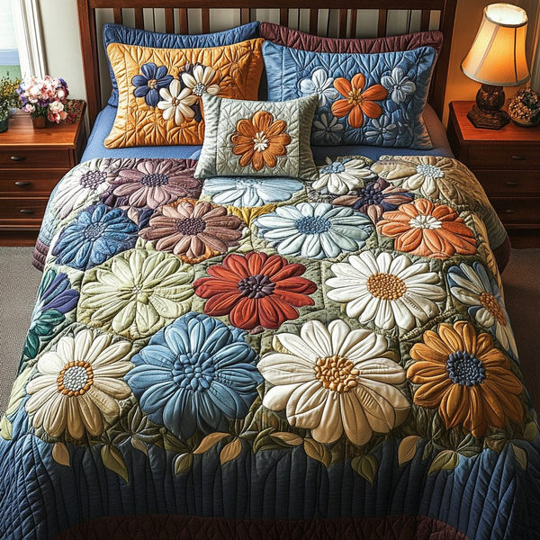 Cozy Petals quilted 3-piece bedding set on a made bed with two matching pillow shams