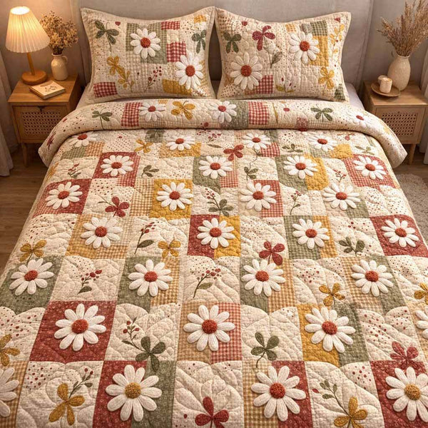 Cozy Petals quilted 3-piece bedding set on a made bed with two matching pillow shams
