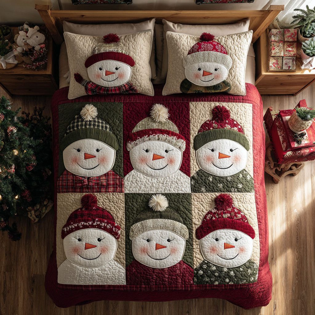 Cozy Snowmen quilted 3-piece bedding set on a made bed with two matching pillow shams