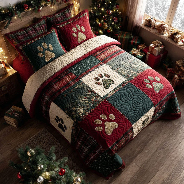 Cozy Tracks quilted 3-piece bedding set on a made bed with two matching pillow shams