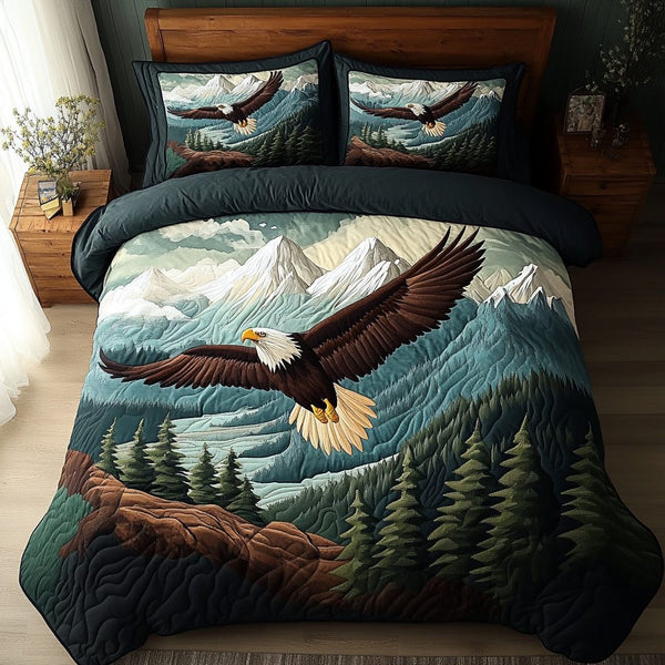Creature Comfort quilted 3-piece bedding set on a made bed with two matching pillow shams