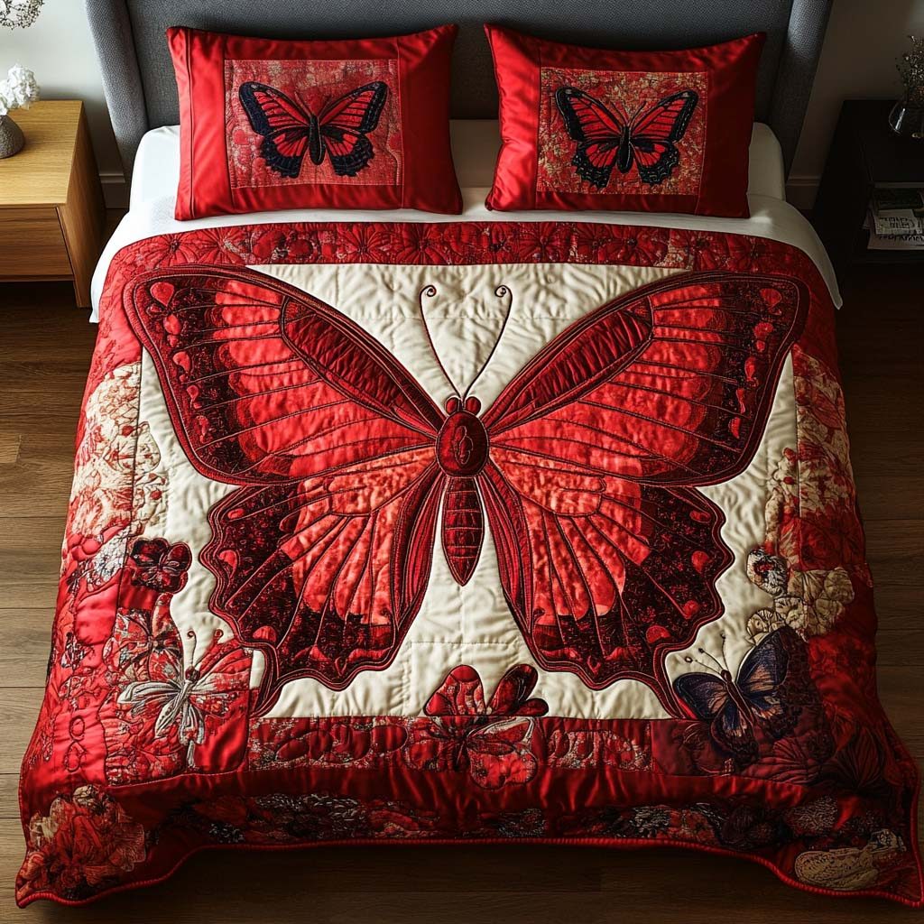 Crimson Beauty quilted 3-piece bedding set on a made bed with two matching pillow shams