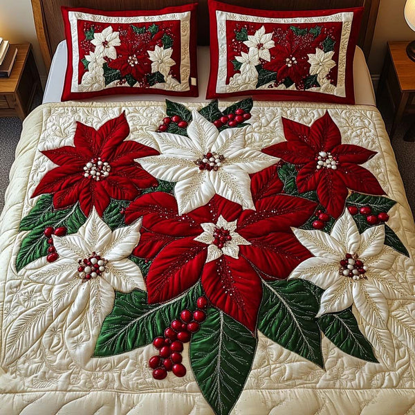 Crimson Blooms quilted 3-piece bedding set on a made bed with two matching pillow shams