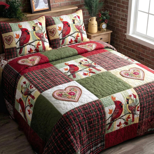 Crimson Companions quilted 3-piece bedding set on a made bed with two matching pillow shams