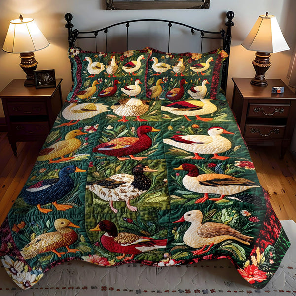 Crimson Duck Garden quilted 3-piece bedding set on a made bed with two matching pillow shams