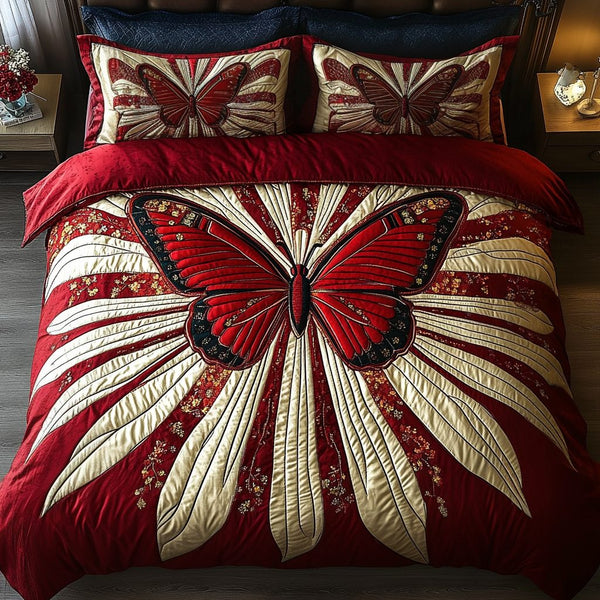 Crimson Flutter quilted 3-piece bedding set on a made bed with two matching pillow shams