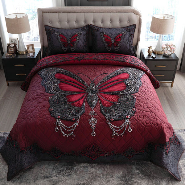 Crimson Majesty quilted 3-piece bedding set on a made bed with two matching pillow shams
