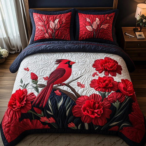 Crimson Spirit quilted 3-piece bedding set on a made bed with two matching pillow shams