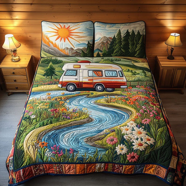 Cross Country Escape quilted 3-piece bedding set on a made bed in a softly lit bedroom