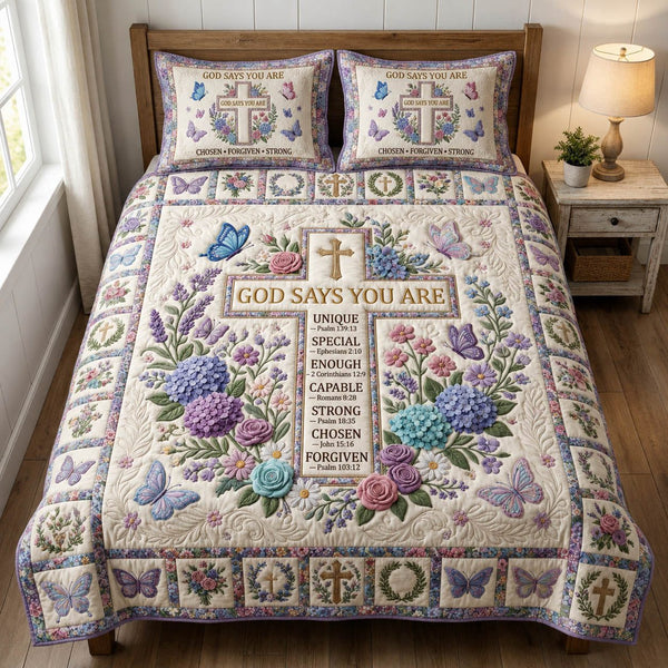 Cross God Says You Are quilted 3-piece bedding set on a made bed in a softly lit bedroom