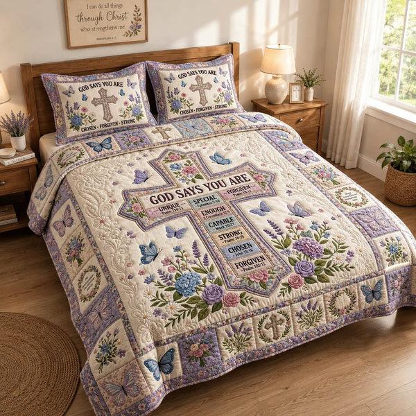 Cross God Says You Are quilted 3-piece bedding set on a made bed in a softly lit bedroom