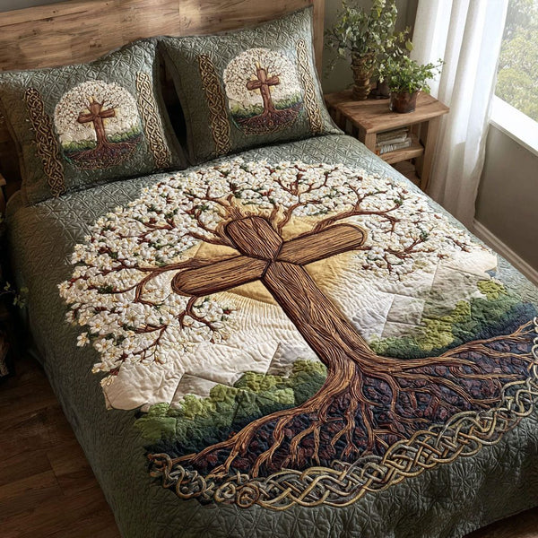 Cross of Glory and Truth quilted 3-piece bedding set on a made bed in a softly lit bedroom