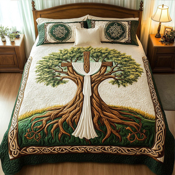 Cross of Glory quilted 3-piece bedding set on a made bed in a softly lit bedroom